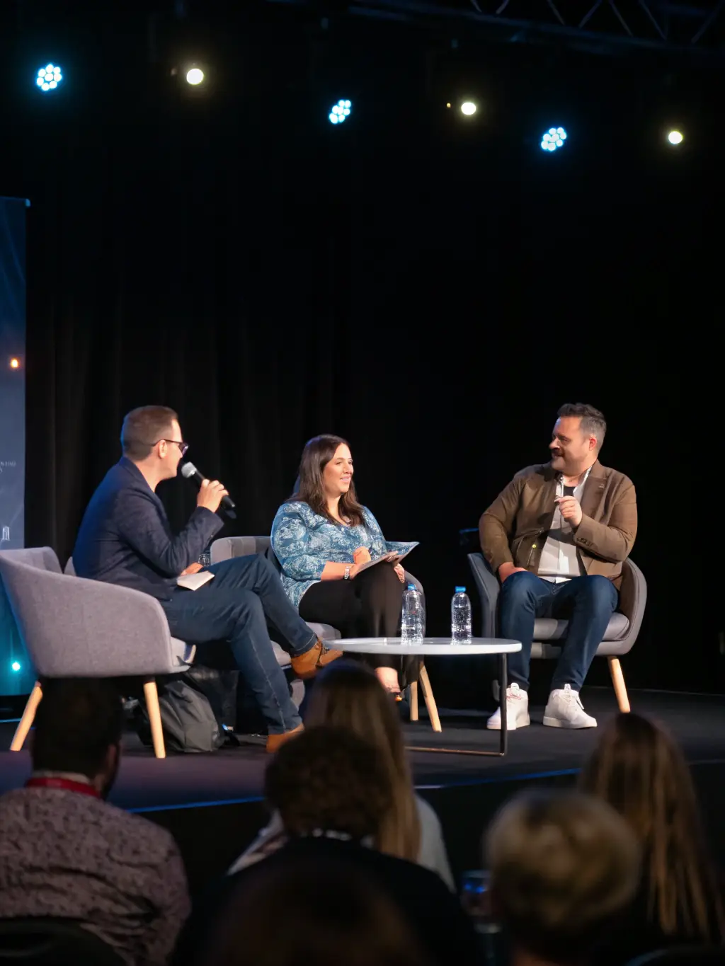 A photograph of a panel discussion at the 'Data Privacy Forum 2024', featuring experts from various industries discussing the implications of the Digital Personal Data Protection Act (DPDP Act) on businesses in India.